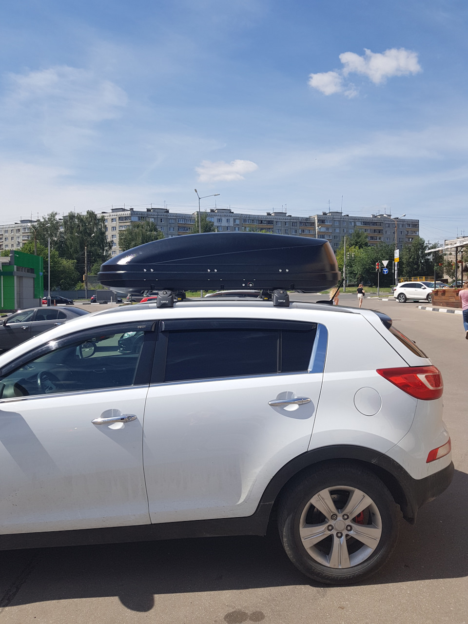 сбоку — KIA Sportage (3G)
